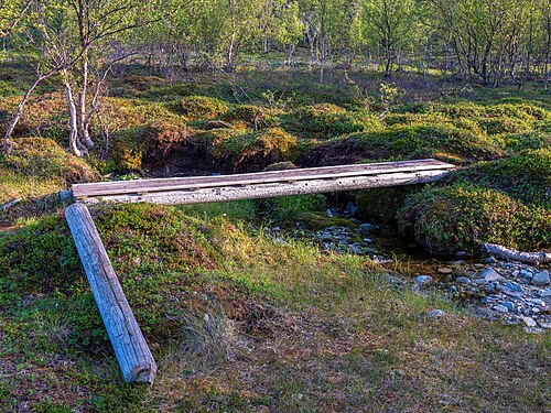 Wooden boardwalk in the valley between Bekkafjord and Langfjorddalen
