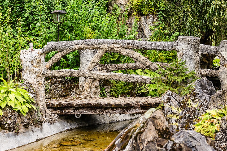 Vulpera, wooden bridge in it Vulpera walking park.