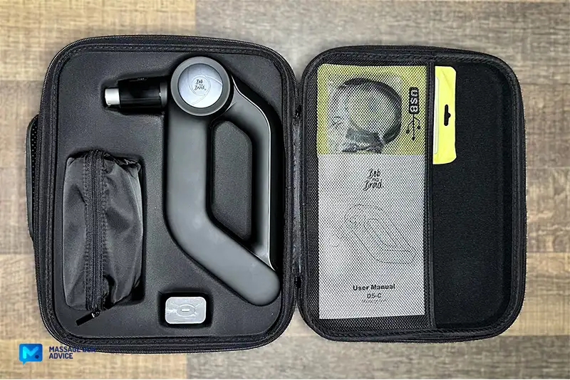 Bob and Brad D5 Pro Review: An Affordable Massage Gun For DOMs 8 Bob and Brad D5 Pro: carrying case open on a table