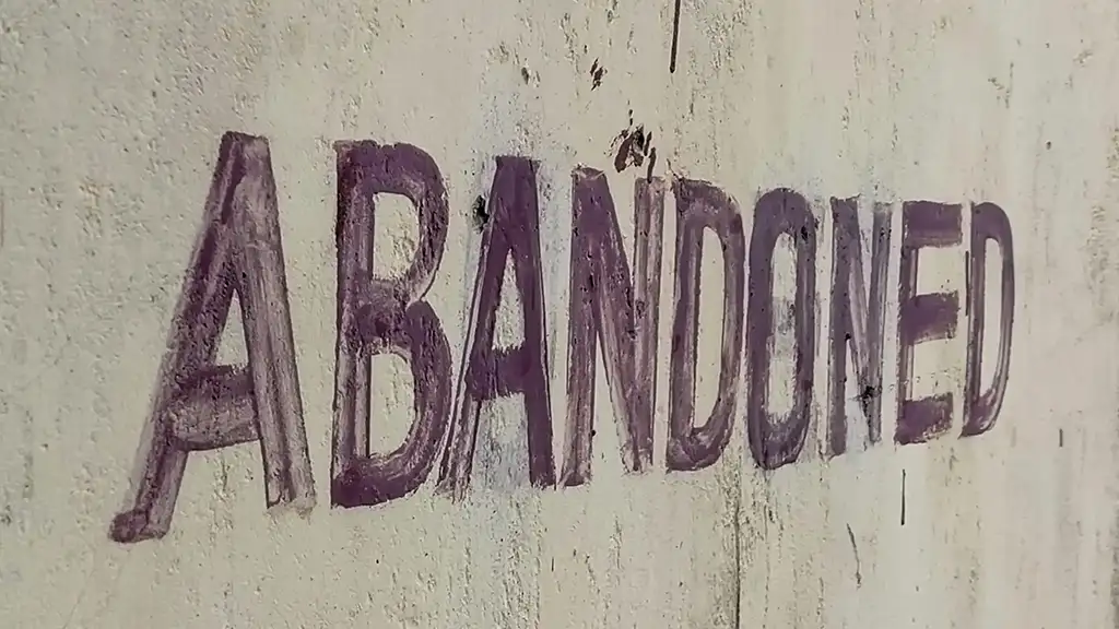 8 Key Factors to Consider Before Buying a Sports Massager 2 Abandoned sign on grey wall