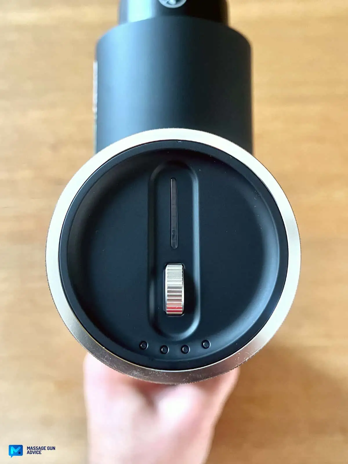Ekrin Kestrel Review - Is This the Ultimate Massage Gun Unicorn? 20 Ekrin Kestrel review: top view showing Control Panel Scroll Wheel Speed with Battery LED indicators Off