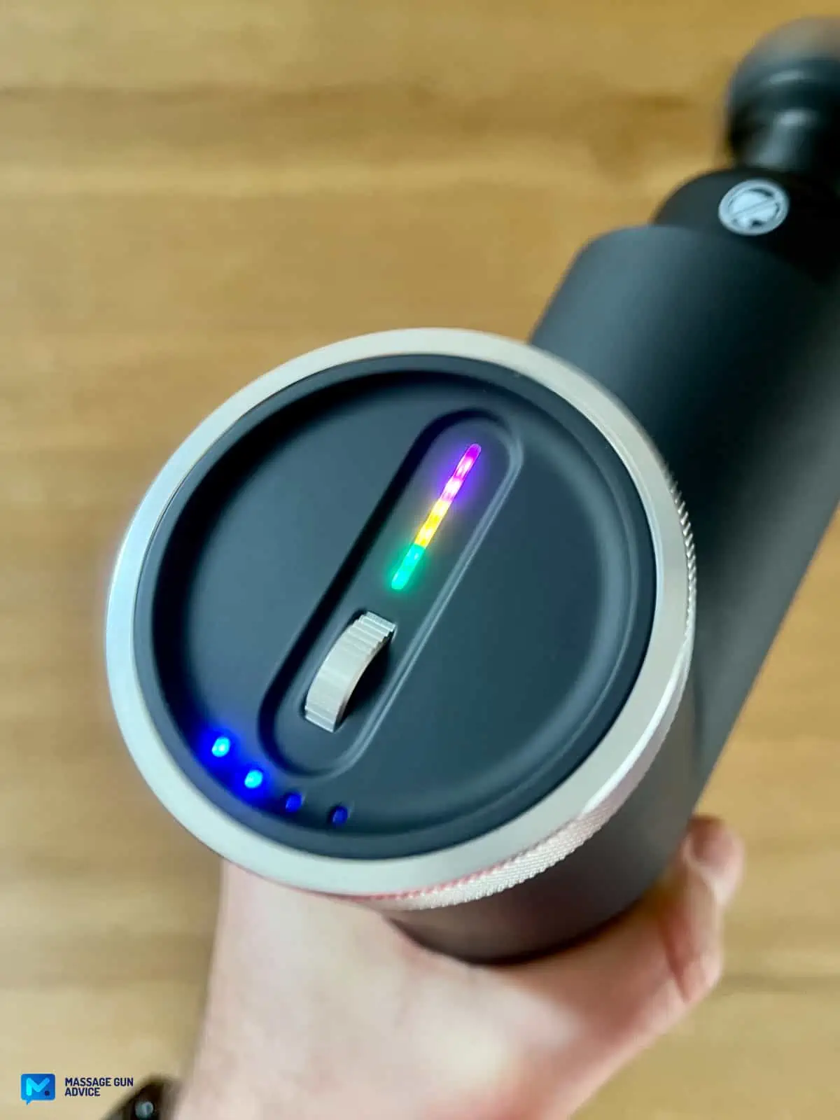 Ekrin Kestrel Review - Is This the Ultimate Massage Gun Unicorn? 21 Ekrin Kestrel review: sports massager top view showing Controls Panel Scroll Wheel Speed with Battery LED indicators On