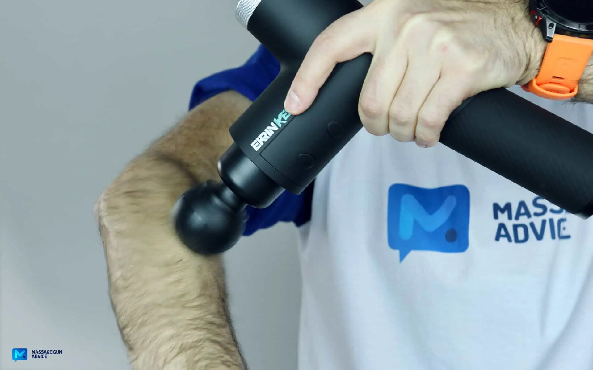 Ekrin Kestrel Review - Is This the Ultimate Massage Gun Unicorn? 43 ekrin Kestrel Massager On man's Forearm