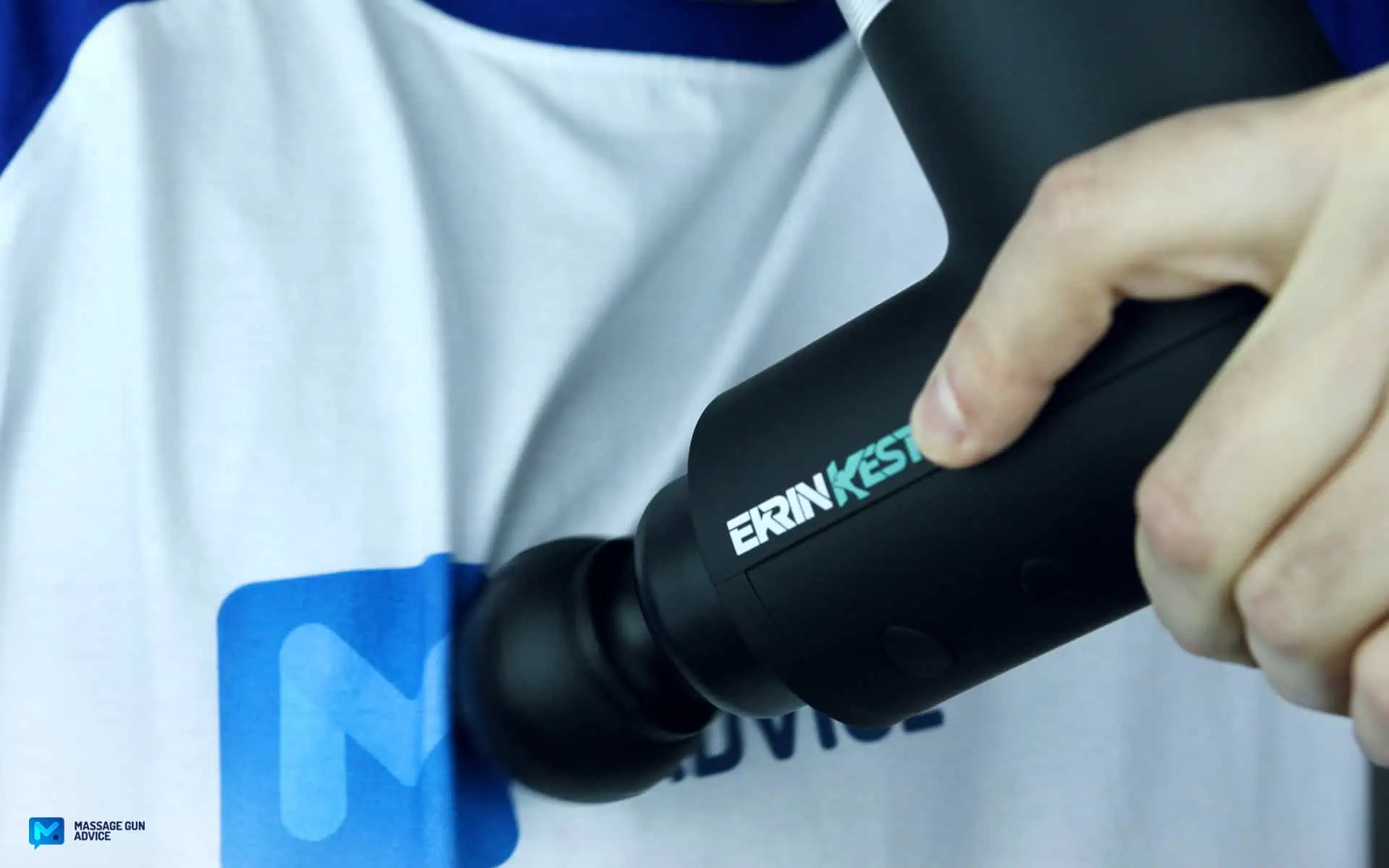 Ekrin Kestrel Review - Is This the Ultimate Massage Gun Unicorn? 38 ekrin Kestrel working on a man's chest.