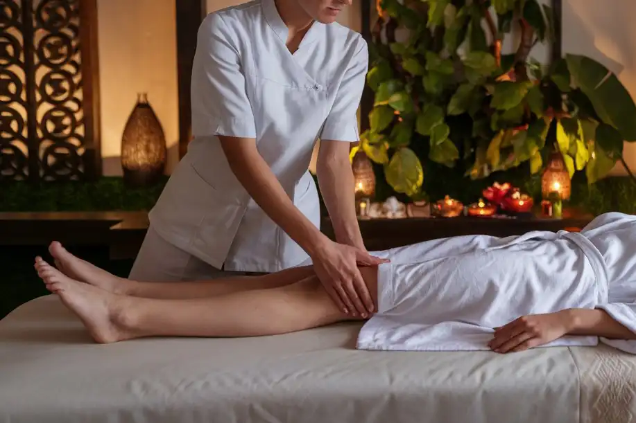 Complete Guide to Compression Therapy: What It Is and How It Benefits You 12 Female Therapist Massaging Patient For Lymph Drainage_Is massage therapy good for lymphatic drainage