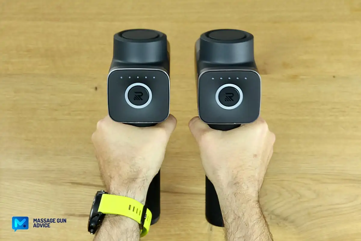 Recovapro SE Review - Surprisingly Good And Versatile Device 32 holding recovapro se and max massage guns side-by-side