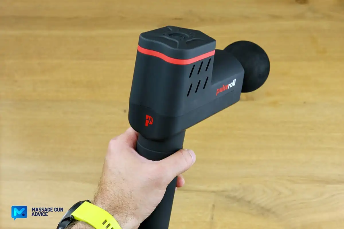 Pulseroll Massage Gun Review - A Decent, Heavy-Duty Percussive Device 13 pulseroll pro holding in hand