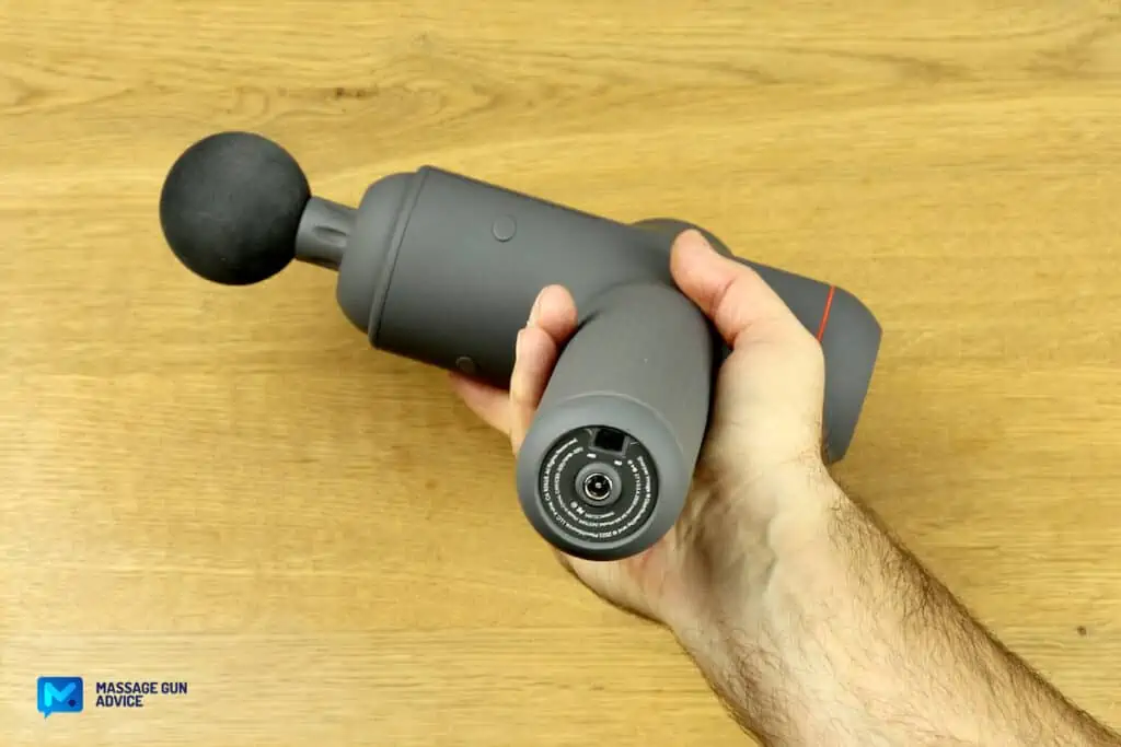 Sharper Image Massager Review – Good on the Outside but Only So-So In Performance 17 sharper image power percussion deep tissue massage held by a hand showing the base of the device