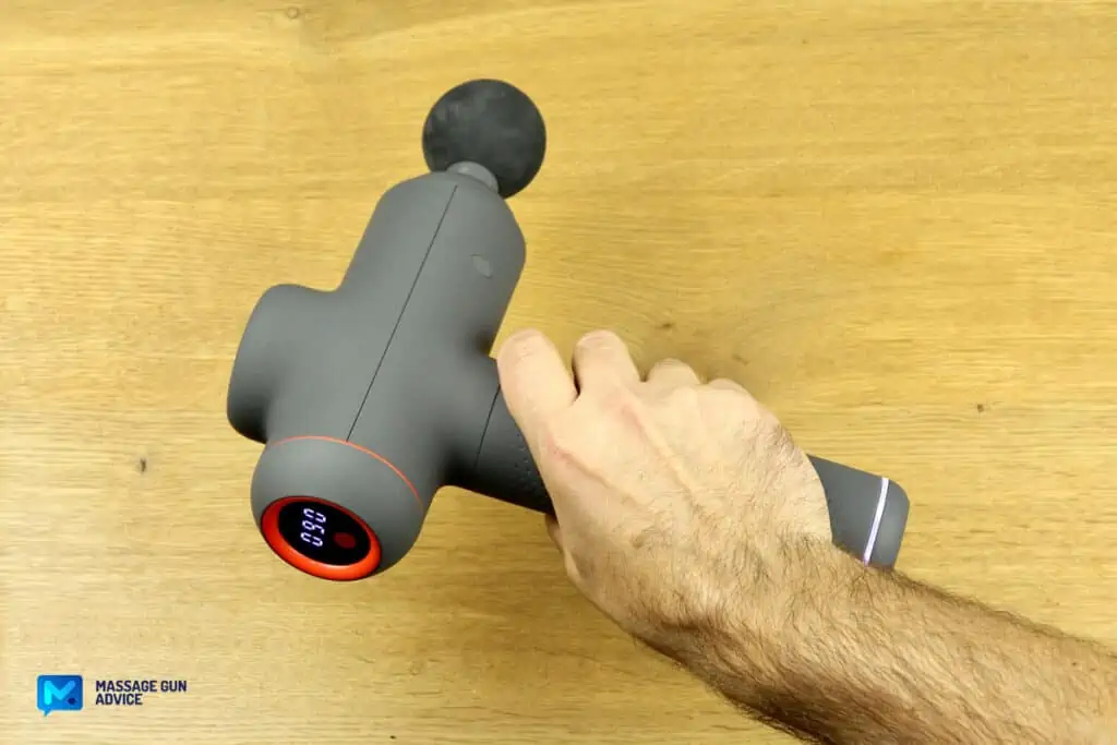 Sharper Image Massager Review – Good on the Outside but Only So-So In Performance 19 sharper image power percussion deep tissue massage held by a hand